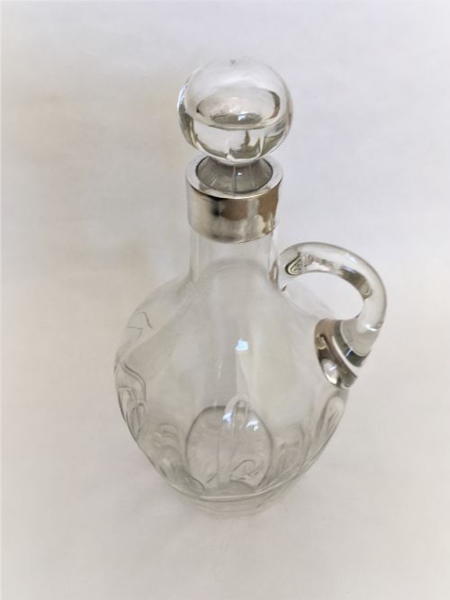 fig 1. An Edwardian silver mounted Whisky decanter