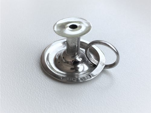fig 1. A Victorian dolls house silver chamberstick