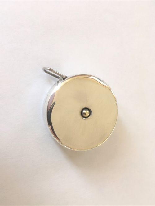 fig 1. A Tiffany & Co. silver tape measure