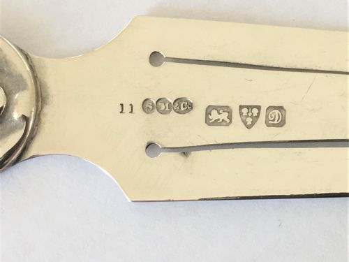 fig 1. A rare Sampson Morden 'Man in the moon' silver bookmark