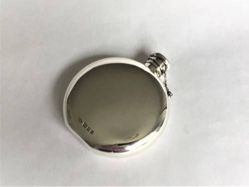 fig 1. A stylish all silver hip flask by Mappin & Webb