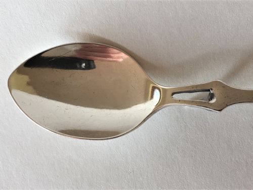 fig 1. An Edwardian silver honey spoon of patented design