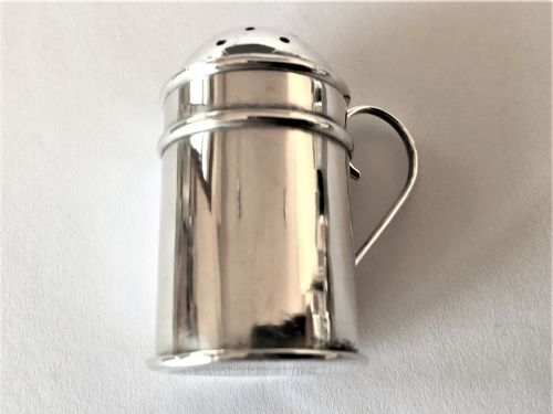 fig 1. An Edwardian silver novelty pepper pot