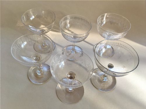 fig 2. A harlequin set of 6 etched champagne bowls