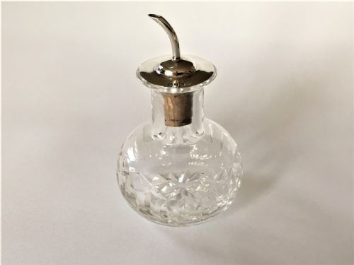 A Silver Mounted Angostura Bitters Jigger