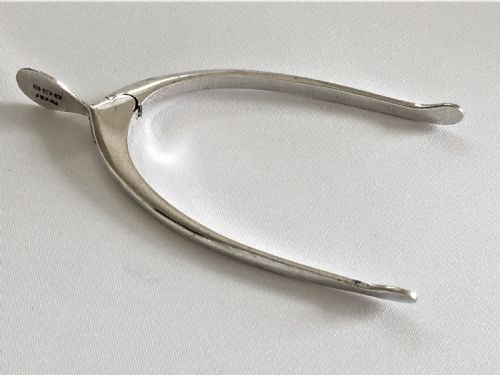 A Pair of Novelty Silver Sprung Wishbone Tongs