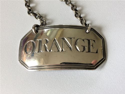 fig 1. A rare Georgian silver 'Orange' decanter label