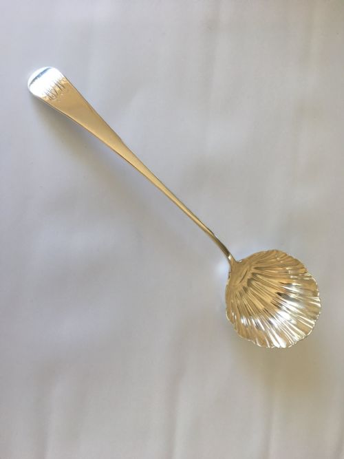 fig 1. A superb 18th Century silver shell bowl soup ladle