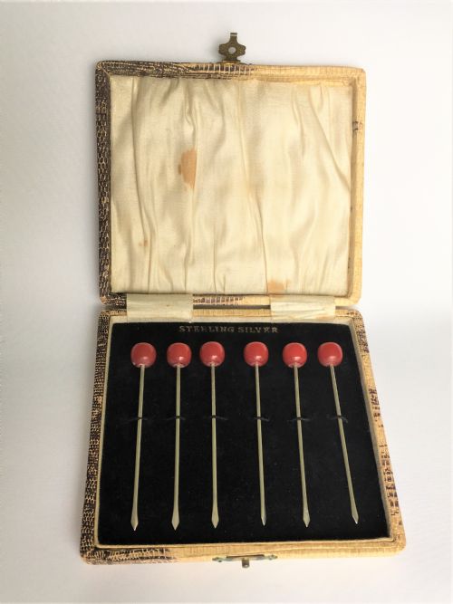 A Charming Set of Six Sterling Silver 'Cherry' Cocktail Sticks