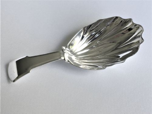 A Georgian Silver Caddy Spoon with Stylised Leaf Bowl