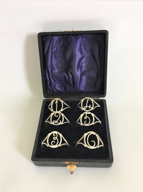 A Superb Set of Six Boxed Edwardian Silver Napkin Rings