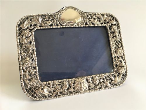 fig 1. A superb pierced silver photo frame by William Comyns
