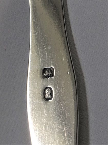 fig 1. A pair of Hester Bateman Bright cut silver tongs