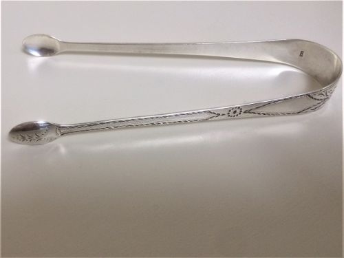 fig 1. A fine pair of 18th Century Bright cut silver tongs