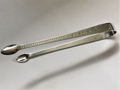 A Charming Pair of Bright Cut Georgian Silver Tongs