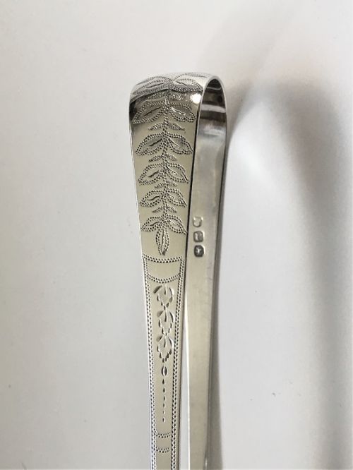 fig 1. A pair of unusual Georgian Bright cut silver tongs