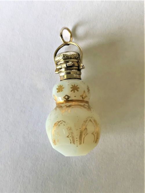 fig 1. A French miniature silver & opaline glass scent bottle
