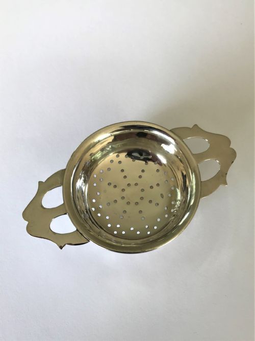 A Stylish Silver Tea Strainer in the Art Nouveau Style