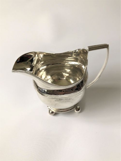 fig 1. A Georgian Newcastle silver cream jug by a female silversmith