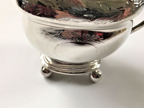 fig 2. A Georgian Newcastle silver cream jug by a female silversmith