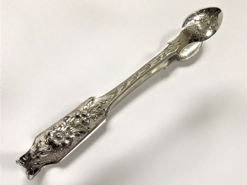 A Fabulous Pair of Cast Irish Silver Tongs