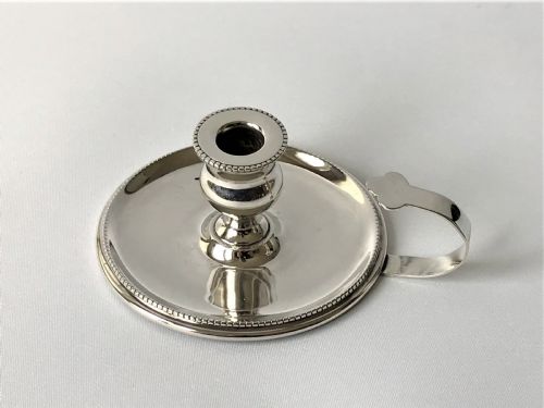 fig 1. A small Edwardian silver go-to-bed chamber stick