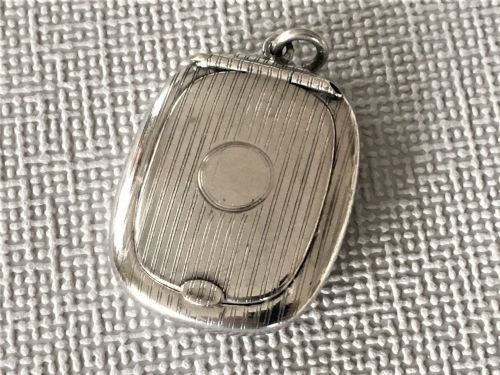 A Lovely Silver Chatelaine Compact & Powder Puff
