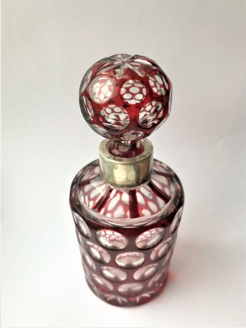 fig 1. A gorgeous silver mounted ruby glass cologne bottle