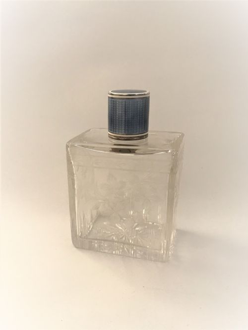 A Fabulous Silver & Guilloche Enamel Mounted Cologne Bottle
