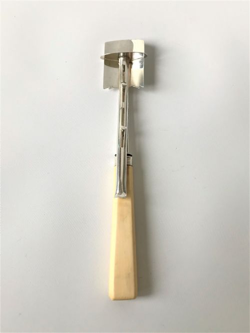 fig 1. A rare Georgian silver stilton scoop