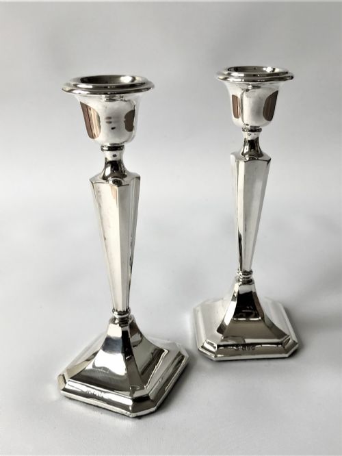 A Fine Pair of Chester Silver Candlesticks
