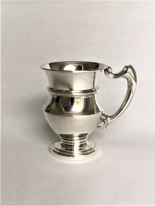 fig 1. A superb boxed silver Christening mug