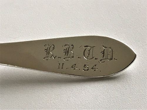 fig 1. A Coronation hallmark silver honey spoon