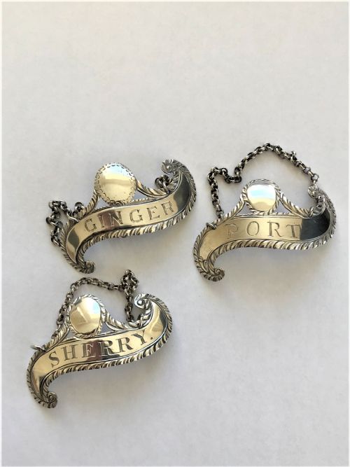 Three Rare Hester Bateman Silver Wine Labels