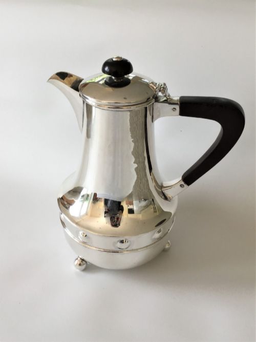 An Arts & Crafts a E Jones Silver Coffee Pot