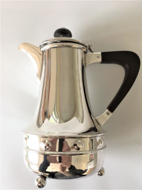 fig 1. An Arts & Crafts A E Jones silver coffee pot