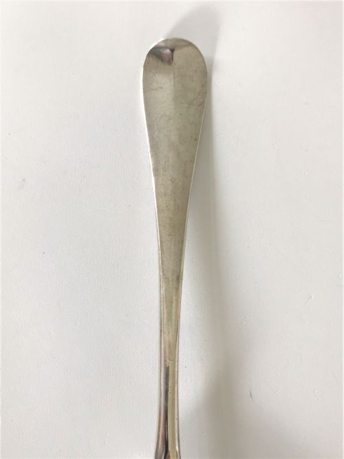 fig 1. A handsome George II silver fancy back serving spoon