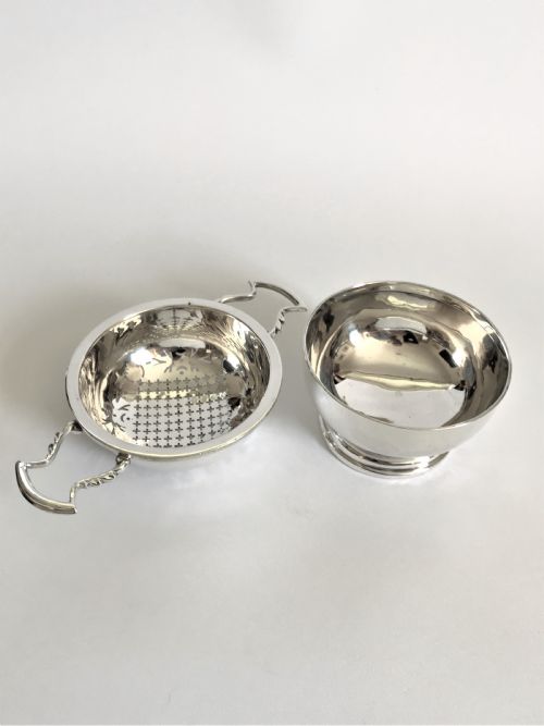 fig 1. A superb silver tea strainer & drip cup