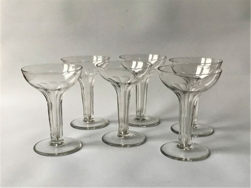 A Set of Six Small Hollow Stem Champagne Glasses