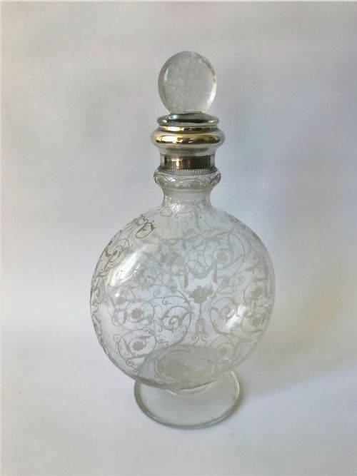 A Fabulous Baccarat Silver Mounted Moonflask Decanter