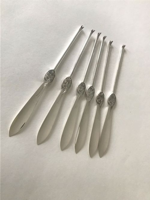 A Rare Set of Six Hallmarked Silver Lobster Picks