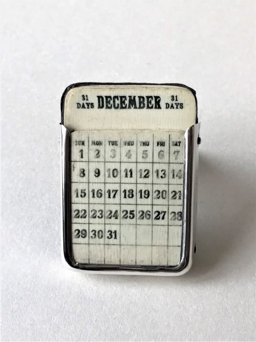 A Charming Miniature Silver Perpetual Calendar
