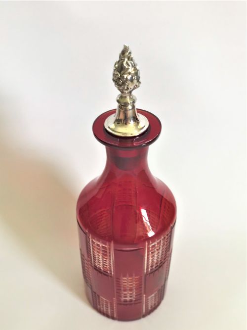 fig 1. A lovely Ruby glass and silver plate wine bottle