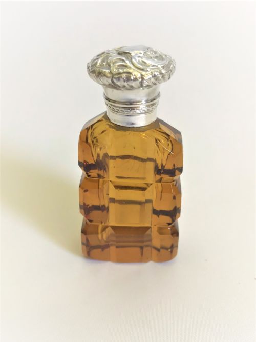A Rare Victorian Silver Mounted Amber Scent Bottle