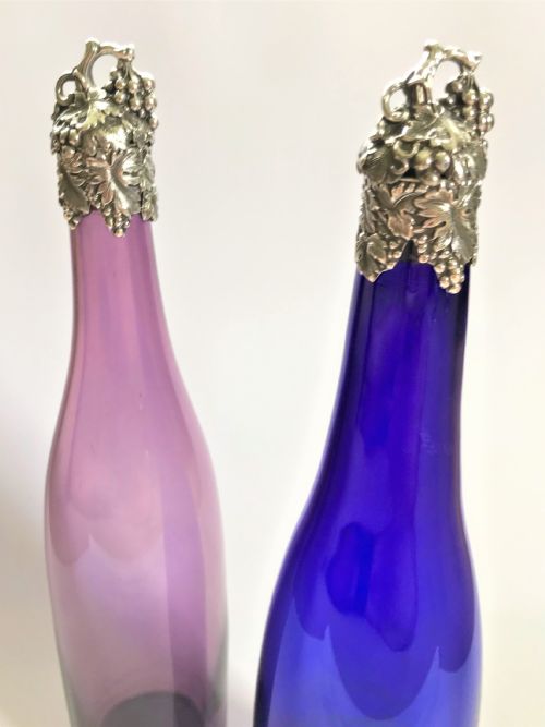 fig 1. A fabulous pair of early Victorian silver mounted wine bottles