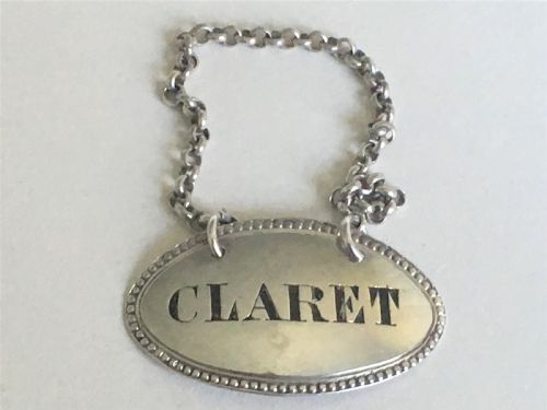 A Handsome Victorian Silver Claret Label