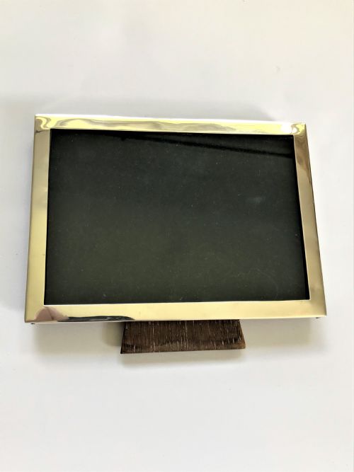 fig 1. A small silver landscape format photo frame