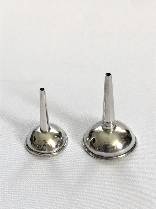 fig 1. Two Georgian silver perfume funnels