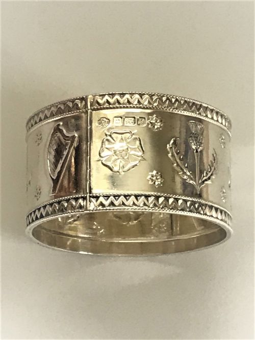fig 1. A United Kingdom motif silver napkin ring