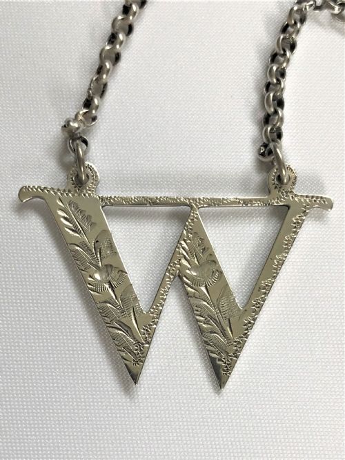 fig 1. A lovely Victorian silver Whisky decanter label